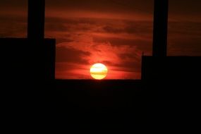 red sun in the sky in the evening