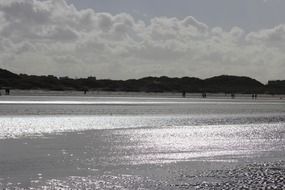 glossy sea at beach