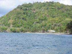 green hilly coast of the Caribbean