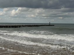 seascape of waves on the north sea in cloudy weather