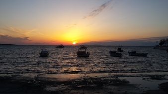 boats on the water at sunset in Turkey