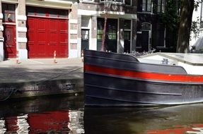 walk along the canal in amsterdam