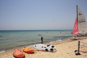 boats on a sandy beach