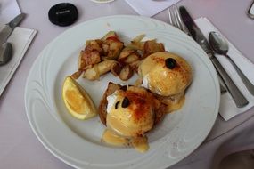 eggs benedict with potatoes for lunch