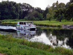 the boat floats on the river