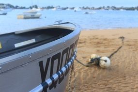 boat on the beach near the water