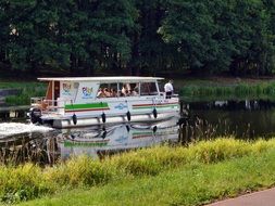 boat with tourists sailing on the river