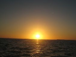 bright yellow sun at sunset