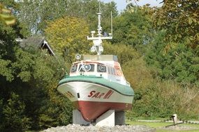 boat as a monument on the north sea coast