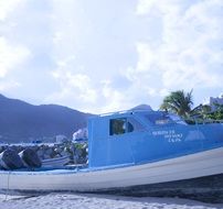 blue boat for tourists