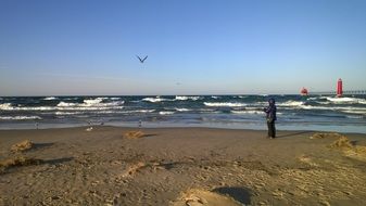 person on beach at winter