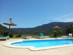 swimming pool in front of the hotel