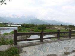 bridge over the river among the picturesque landscape