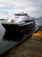 ship stands near the pier in a port