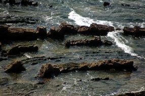 rocks in the middle of the ocean