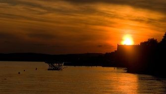 view of the sunset behind the building