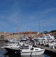 yachts and boats in the harbor in saint tropez