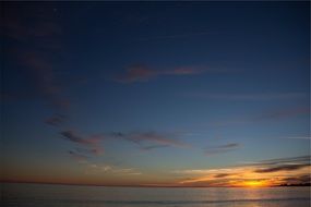 blue sky and sun beyond the horizon