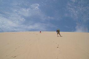 Climbing on the sand dunes of France