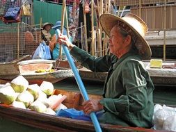 fruit vendor on the boat in Bangkok