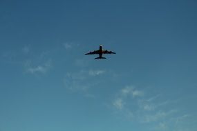 liner in the blue sky on a clear day
