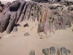 Colorful rocks on the sandy beach