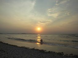 bright setting sun over the baltic sea