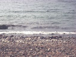waves on a stone beach