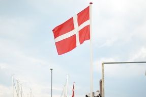 danemark flag at cloudy sky