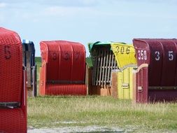 bright deck chairs on the north sea