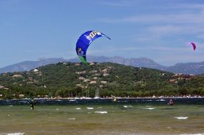 Kitesurfing on the beach in on the holiday