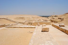 ruins of ancient buildings among the sand in Egypt