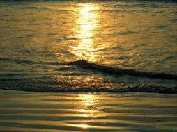 sunset reflection on ocean surface