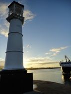 photo of a white lighthouse in Kirkwall, Scotland