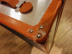 corner of metal luggage box