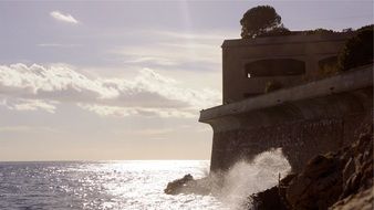 waves on coastal cliffs on a sunny day