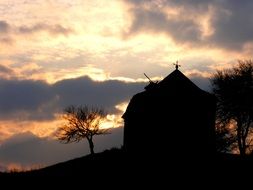 Silhouette of the church at sunset