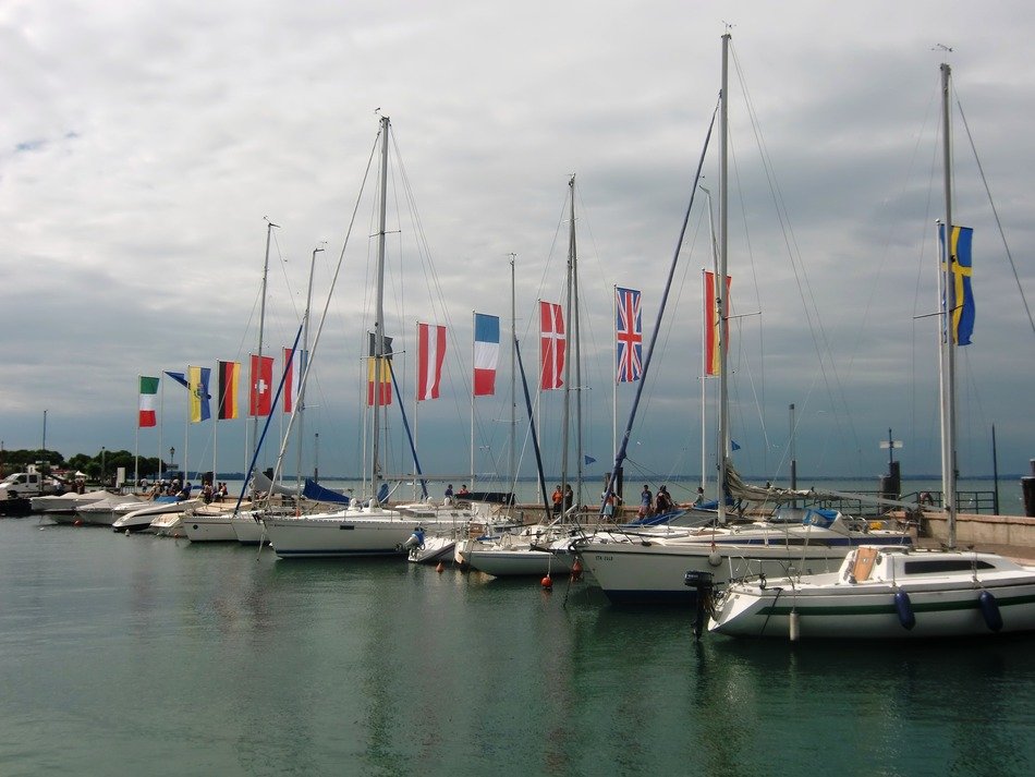 boats with flags in italy