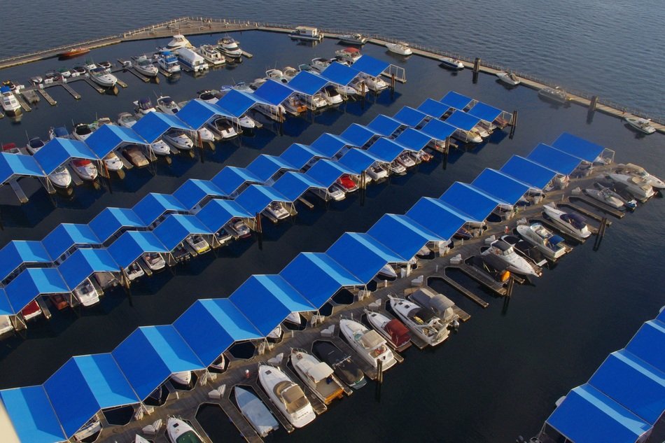 top view of blue canopies on the marina