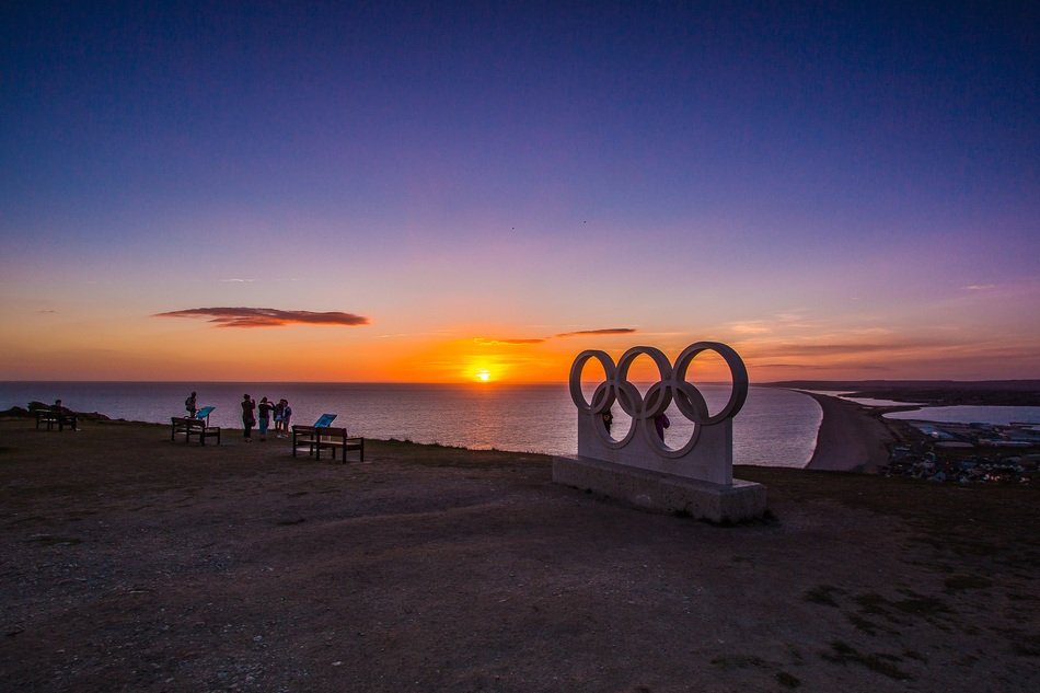 beach with figures at sunset
