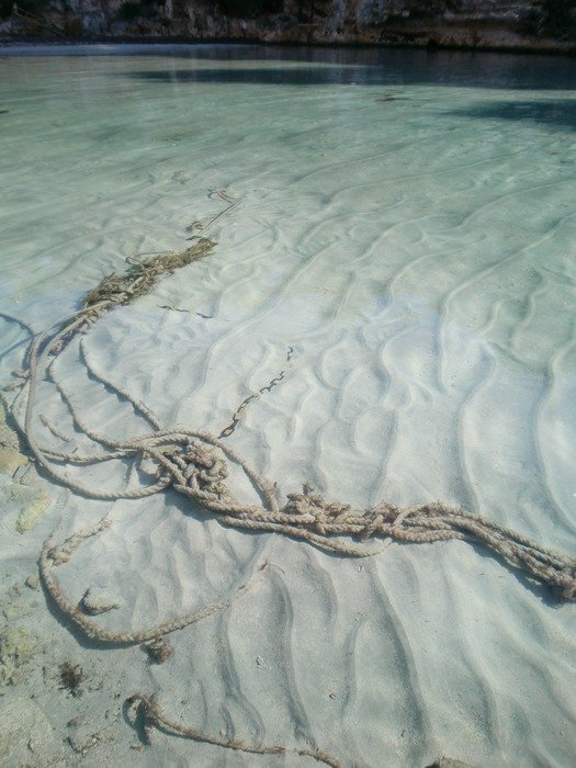rope under water on the beach