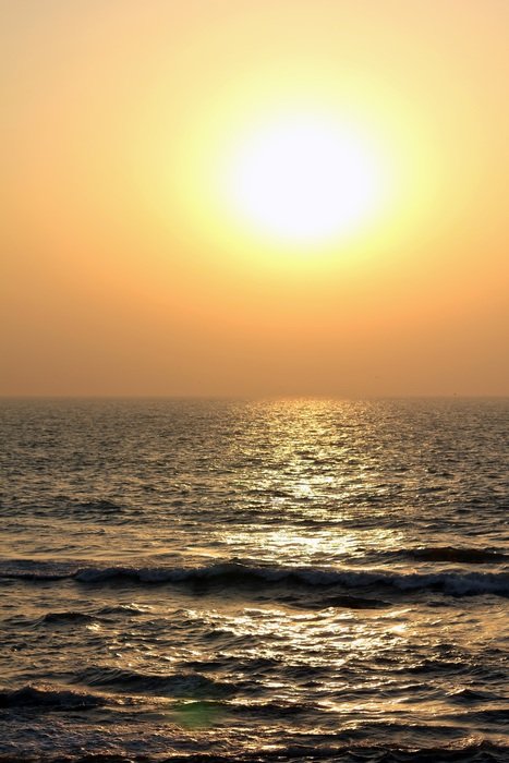 landscape of clear colorful sunset over the ocean