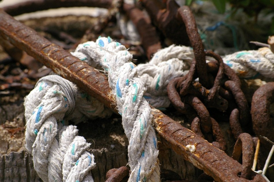 Rusty anchor, chain and rope