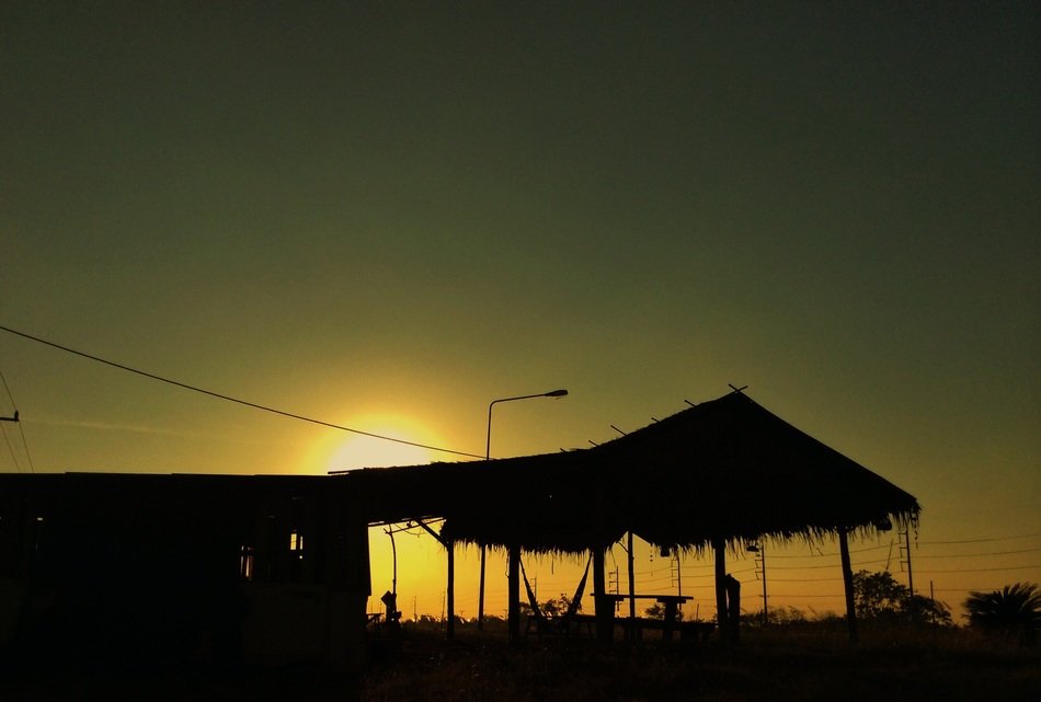 landscape of the summer cottage at the sunset