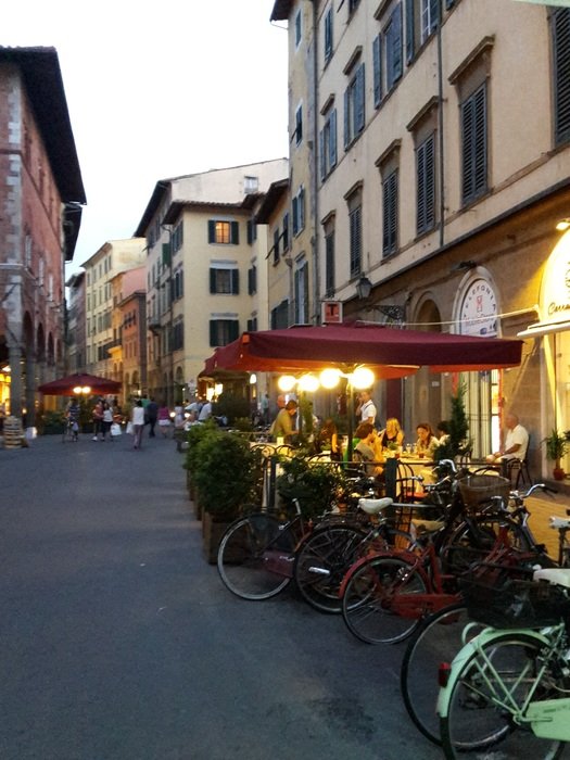street cafe in the evening in pisa