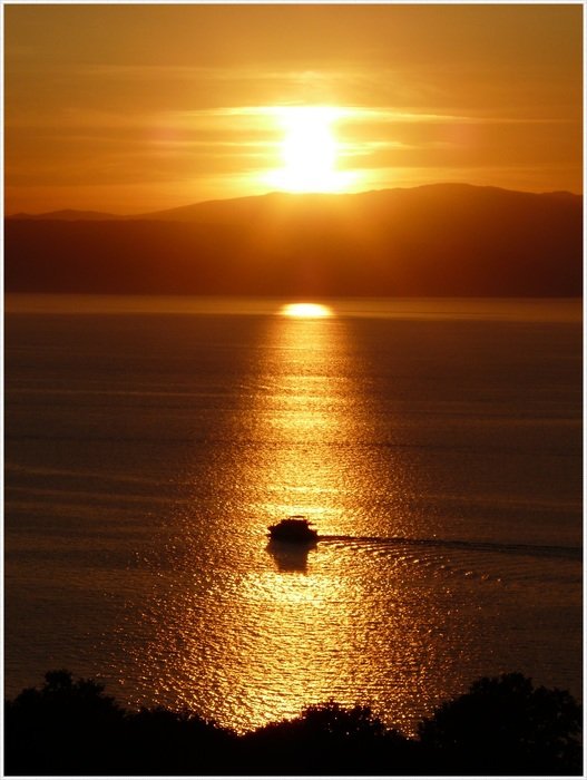 line on the water from sunset