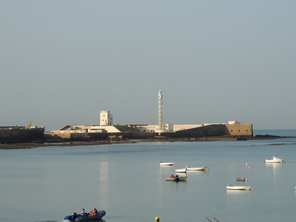 lighthouse and pier on the ocean