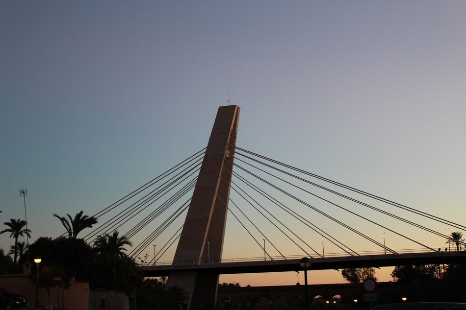 bridge over the river at dusk at sunset