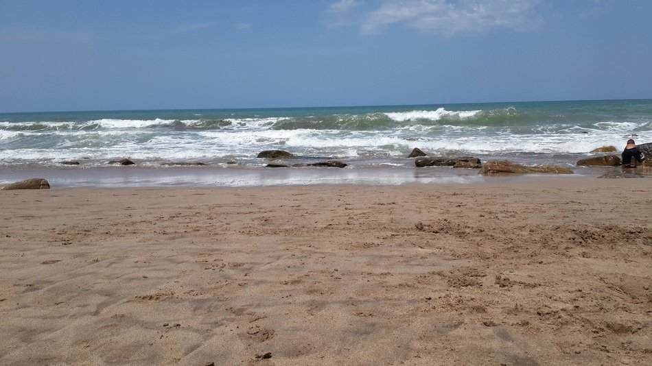 surf on a sandy beach