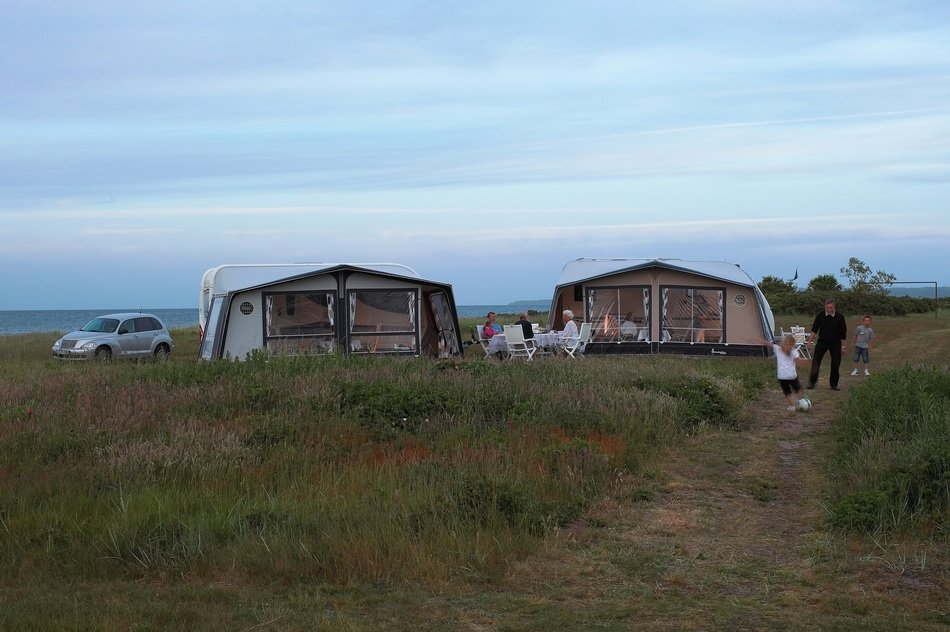 tents and cars on the meadow